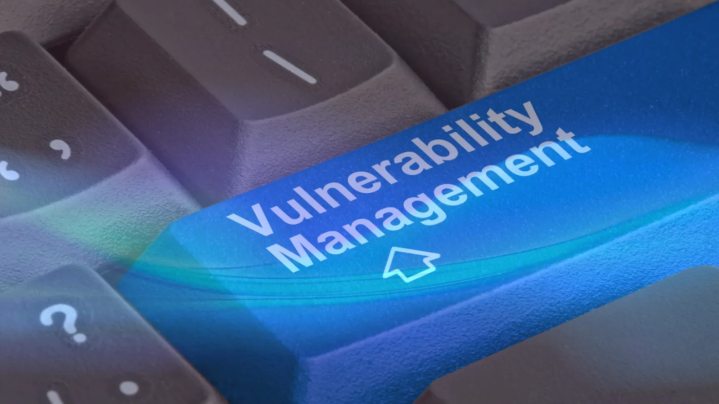 Keyboard enter button changed to say “Vulnerability Management” with an up arrow
